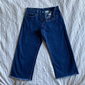 Levis 577 lower rise loose fit - dark wash, size 8, raw hem, cropped